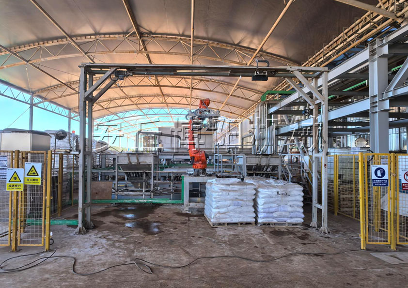 尿素顆粒自動拆垛拆包機 尿素全自動拆包機械手現場